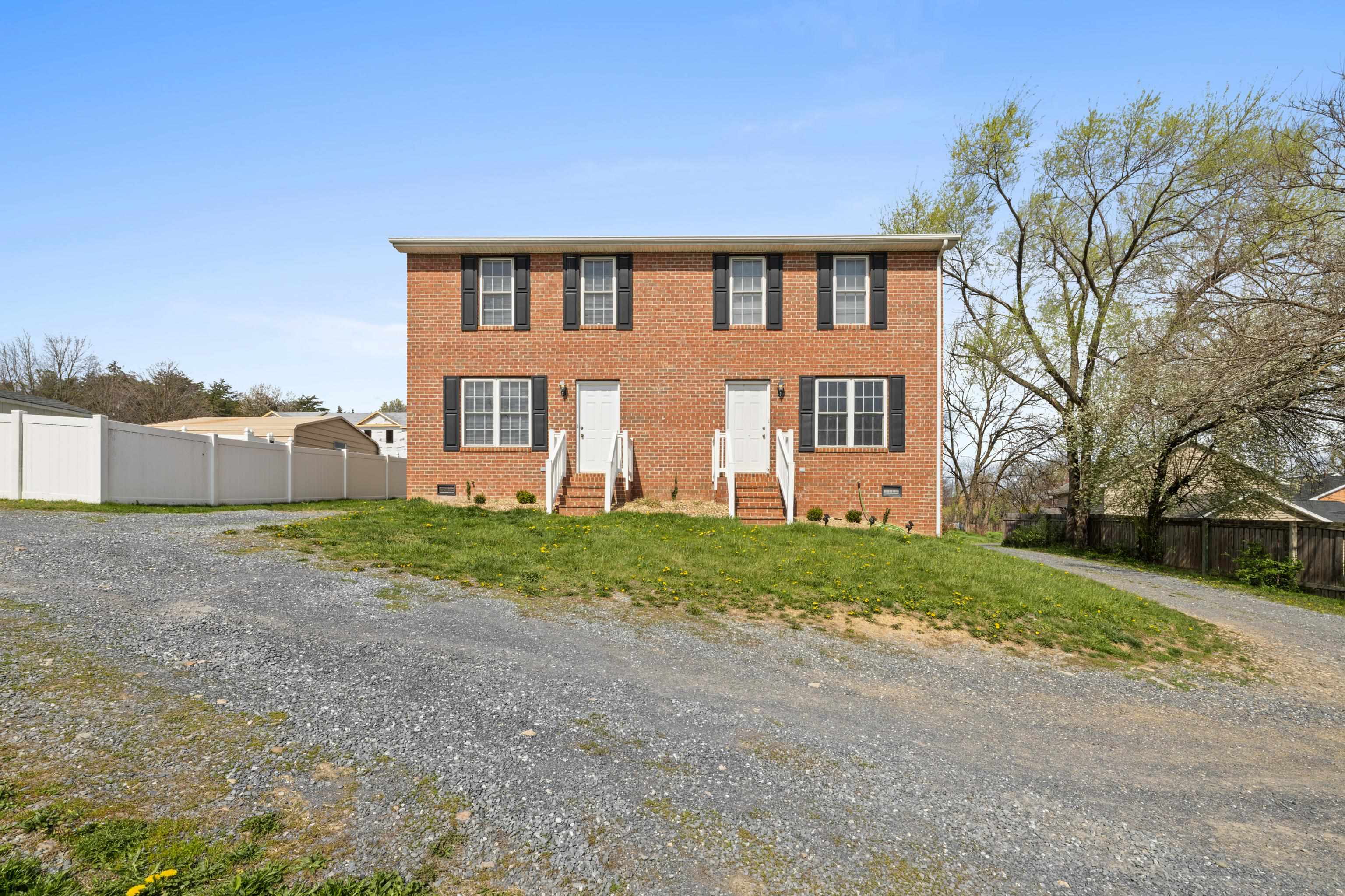 108 Pleasant Hill Road, Unit A & B Harrisonburg, VA 22801 - Photo 6 of 65 a view of a house with a yard
