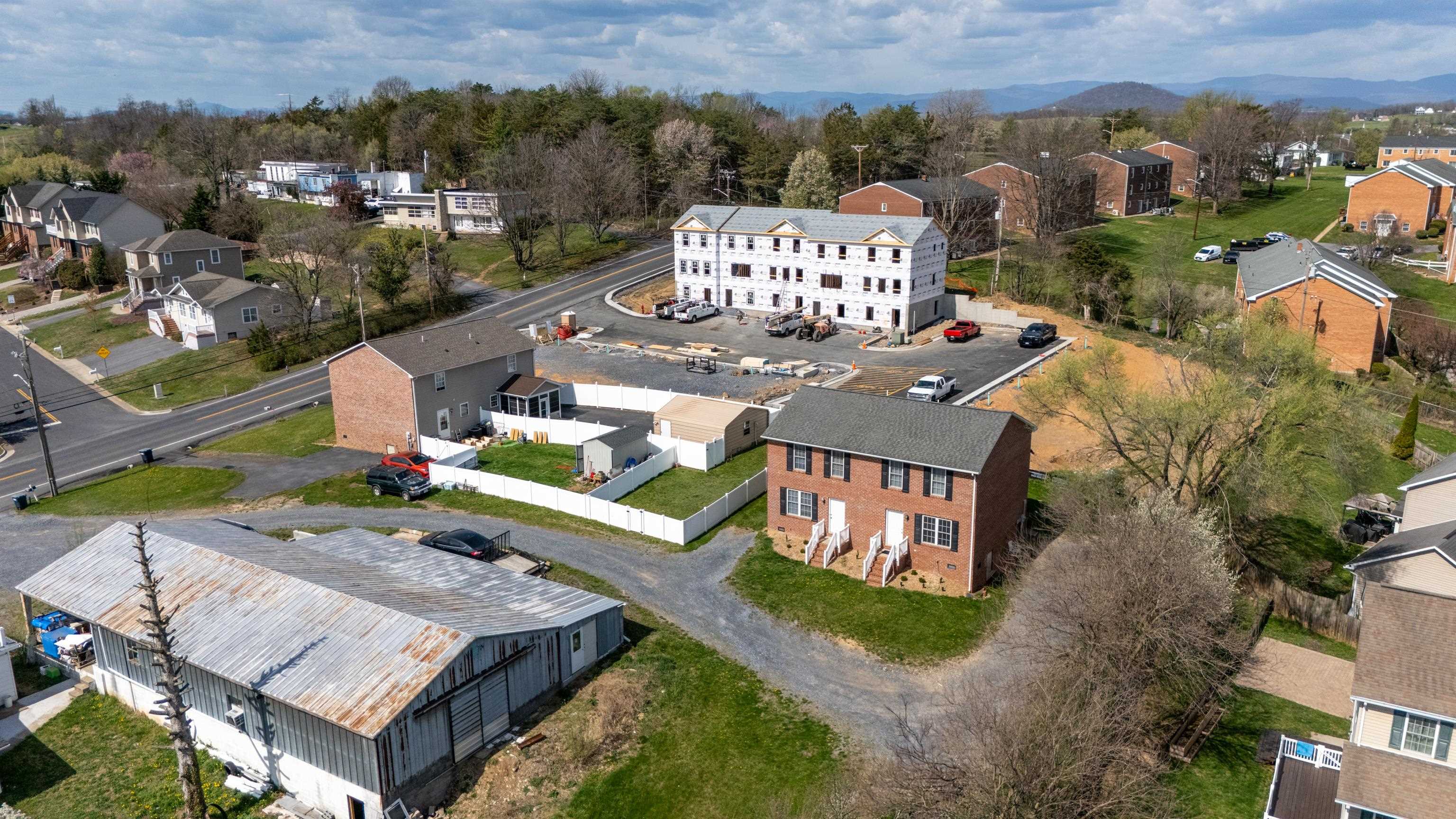108 Pleasant Hill Road, Unit A & B Harrisonburg, VA 22801 - Photo 63 of 65 an aerial view of a house with a big yard