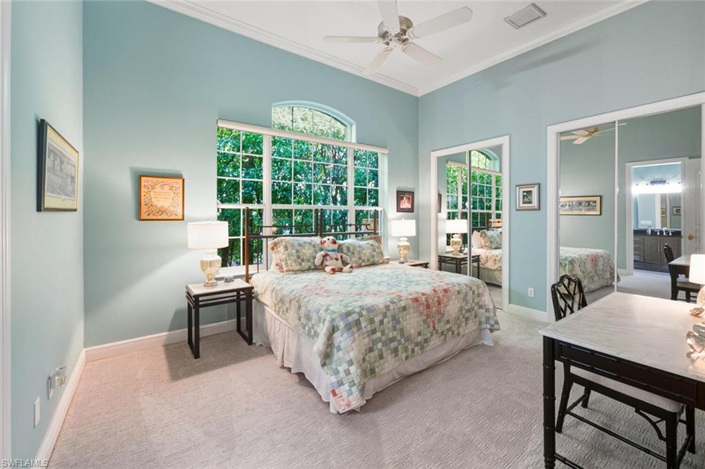 396 Terracina Way Naples, FL 34119 - Photo 42 of 50 Bedroom with carpet flooring, crown molding, and a ceiling fan