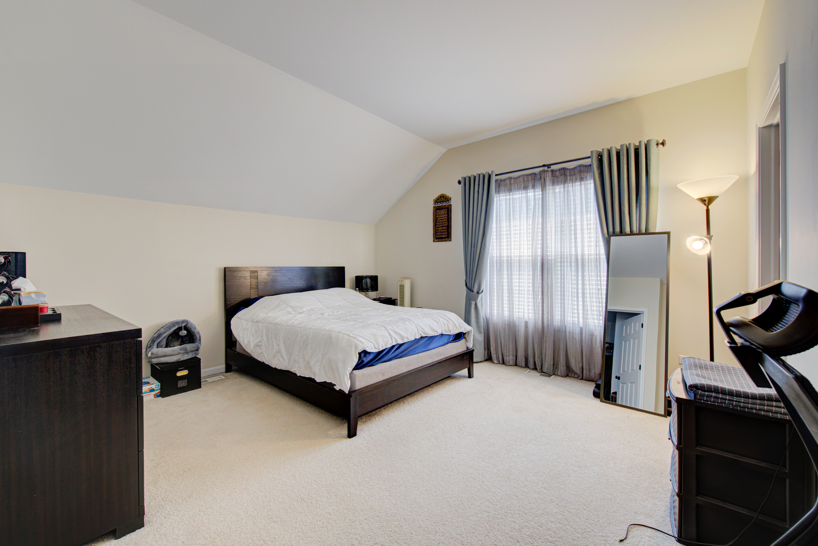 24520 Rockefeller Court Plainfield, IL 60544 - Photo 23 of 57 a bedroom with a bed and wooden floor