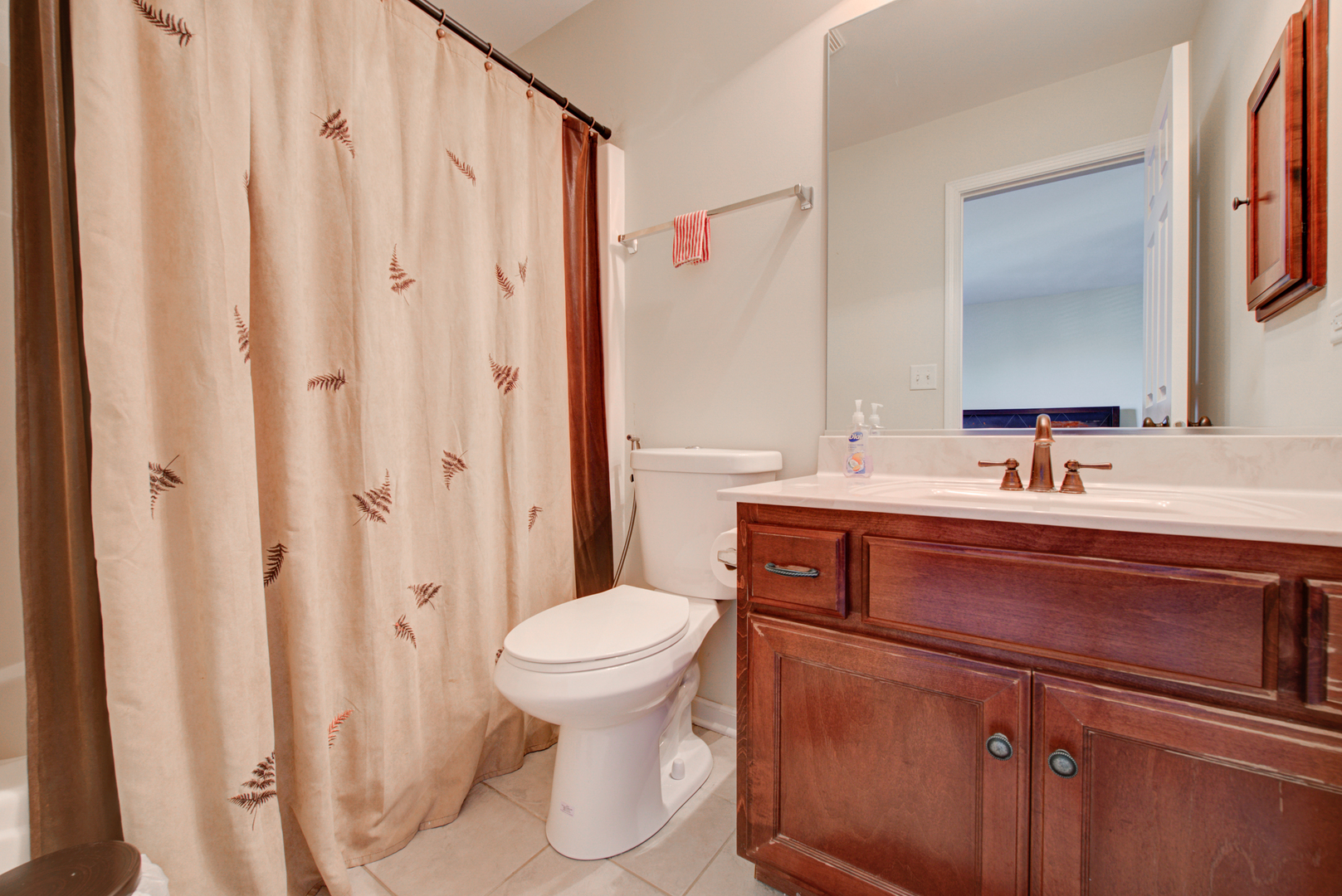 24520 Rockefeller Court Plainfield, IL 60544 - Photo 29 of 57 a bathroom with a sink a toilet and shower