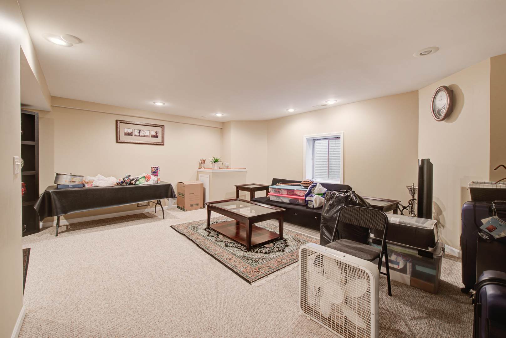 24520 Rockefeller Court Plainfield, IL 60544 - Photo 46 of 57 a living room with furniture gym equipment and a window