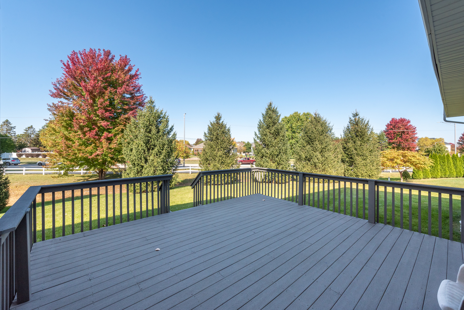 24520 Rockefeller Court Plainfield, IL 60544 - Photo 55 of 57 a view of a balcony with wooden floor