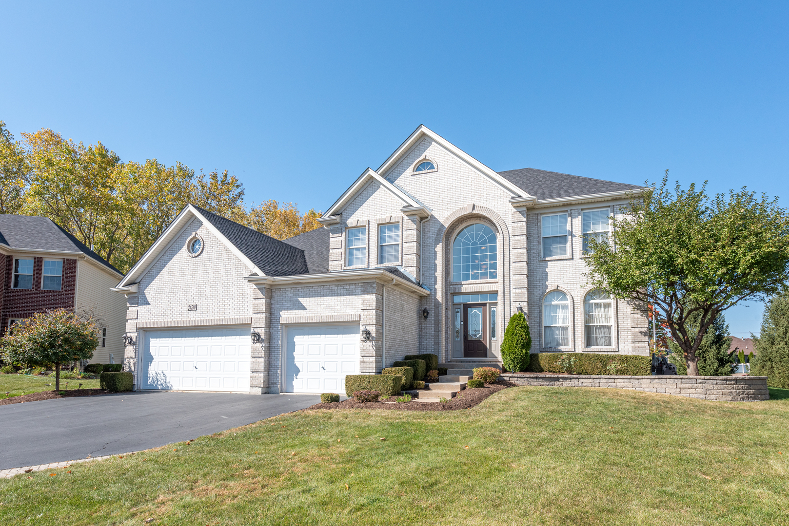 24520 Rockefeller Court Plainfield, IL 60544 - Photo 57 of 57 a front view of a house with a yard
