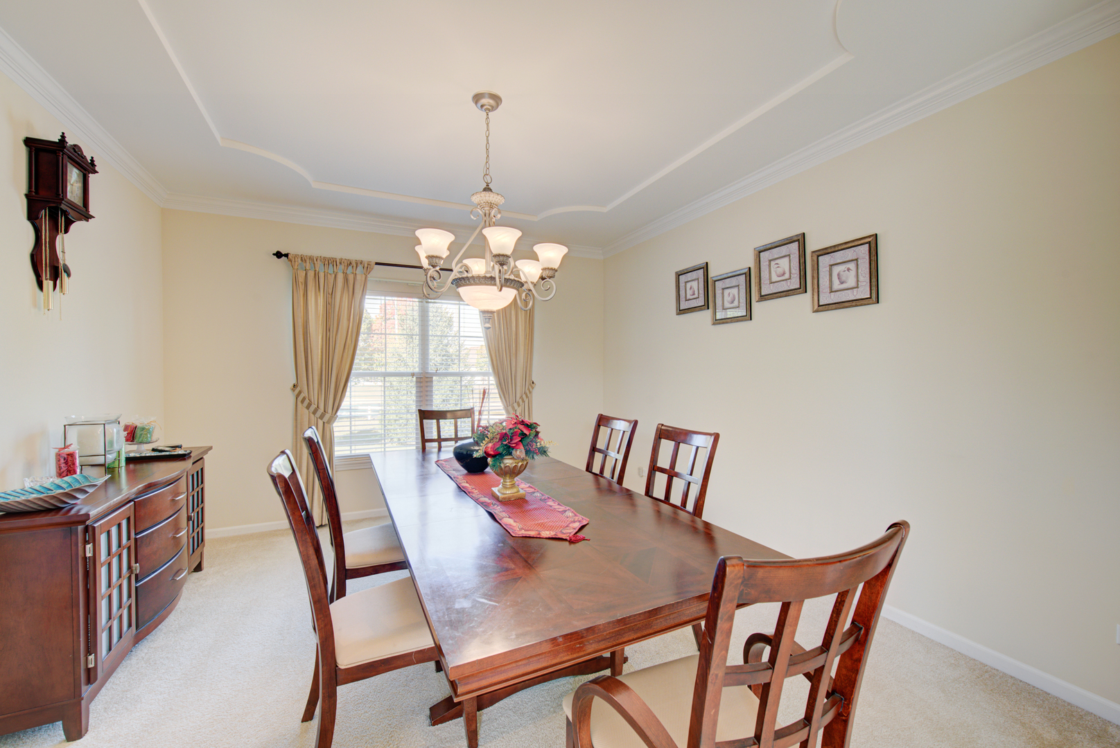 24520 Rockefeller Court Plainfield, IL 60544 - Photo 8 of 57 a view of a dining room with furniture window and chandelier