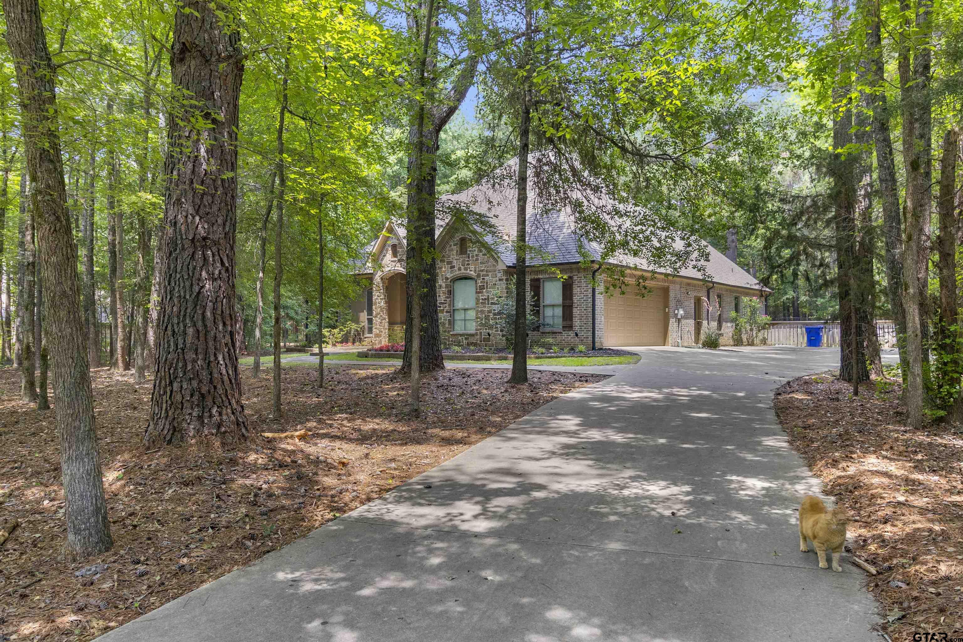 21755 Pagosa Ranch Road Bullard, TX 75757 - Photo 1 of 37 a view of a house with a tree in the background