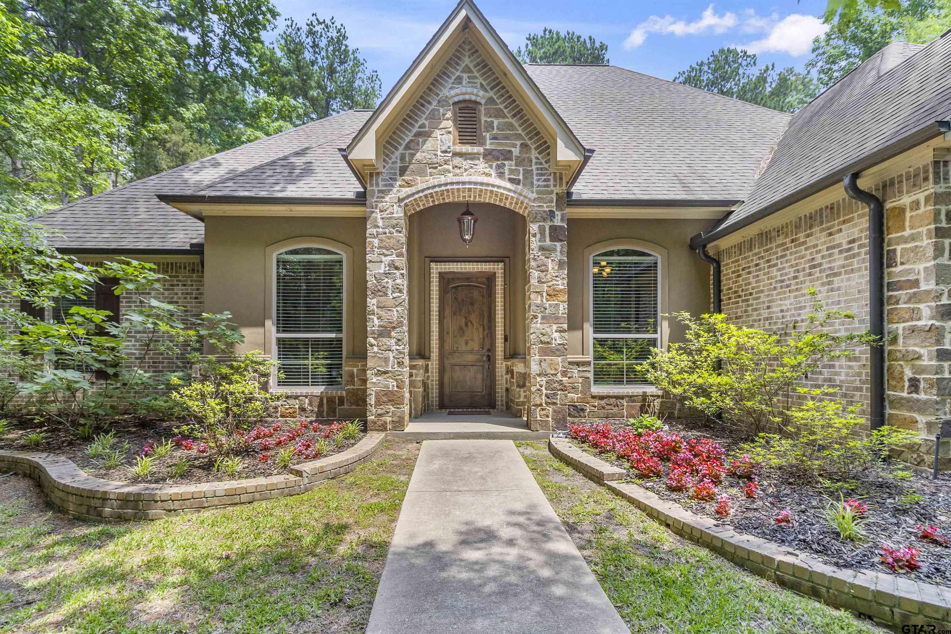 21755 Pagosa Ranch Road Bullard, TX 75757 - Photo 2 of 37 a front view of a house with a yard