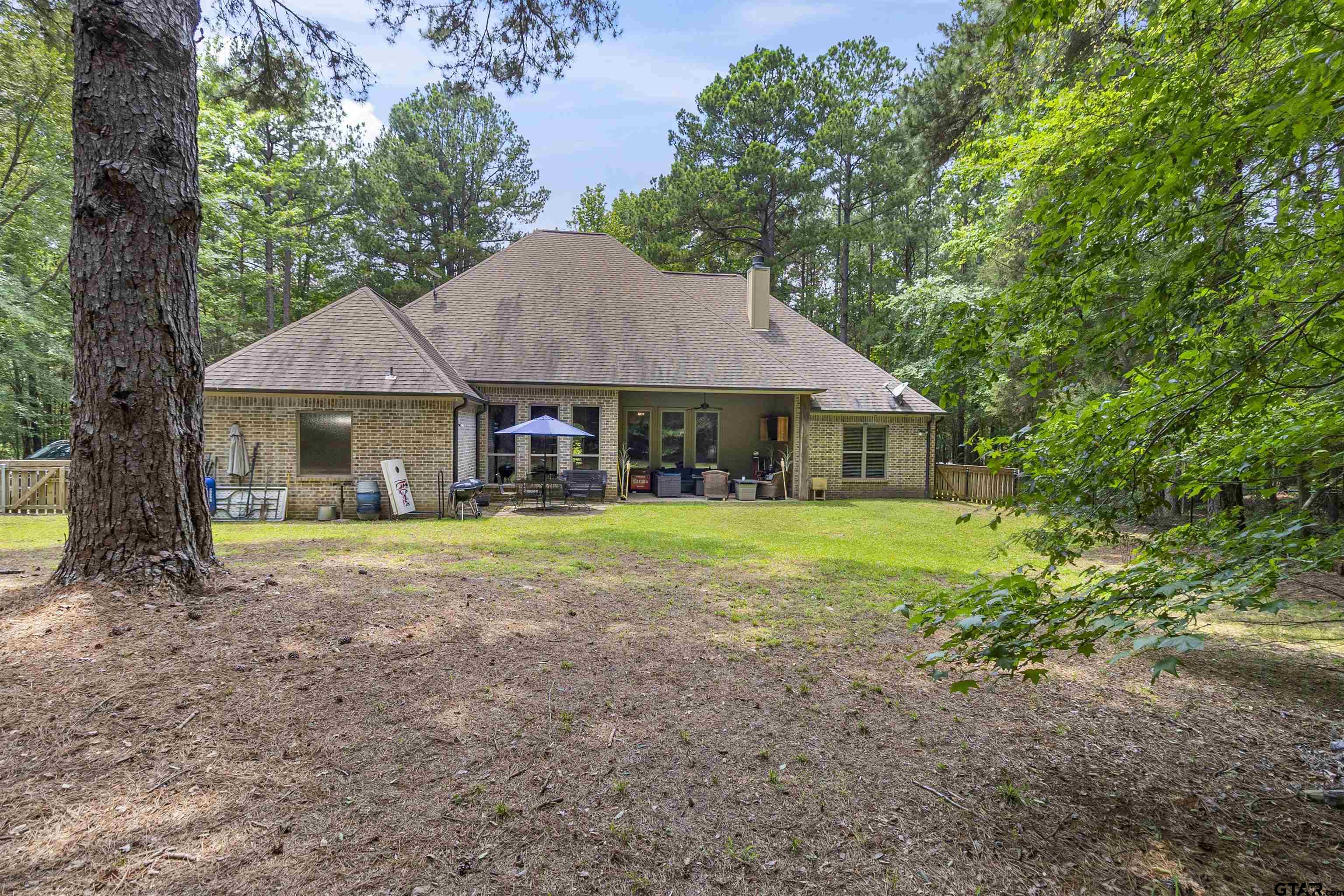 21755 Pagosa Ranch Road Bullard, TX 75757 - Photo 9 of 37 a view of a house with a yard