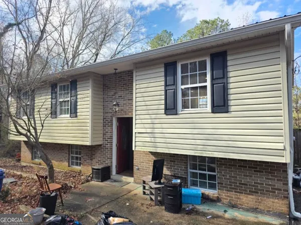 a front view of a house with patio