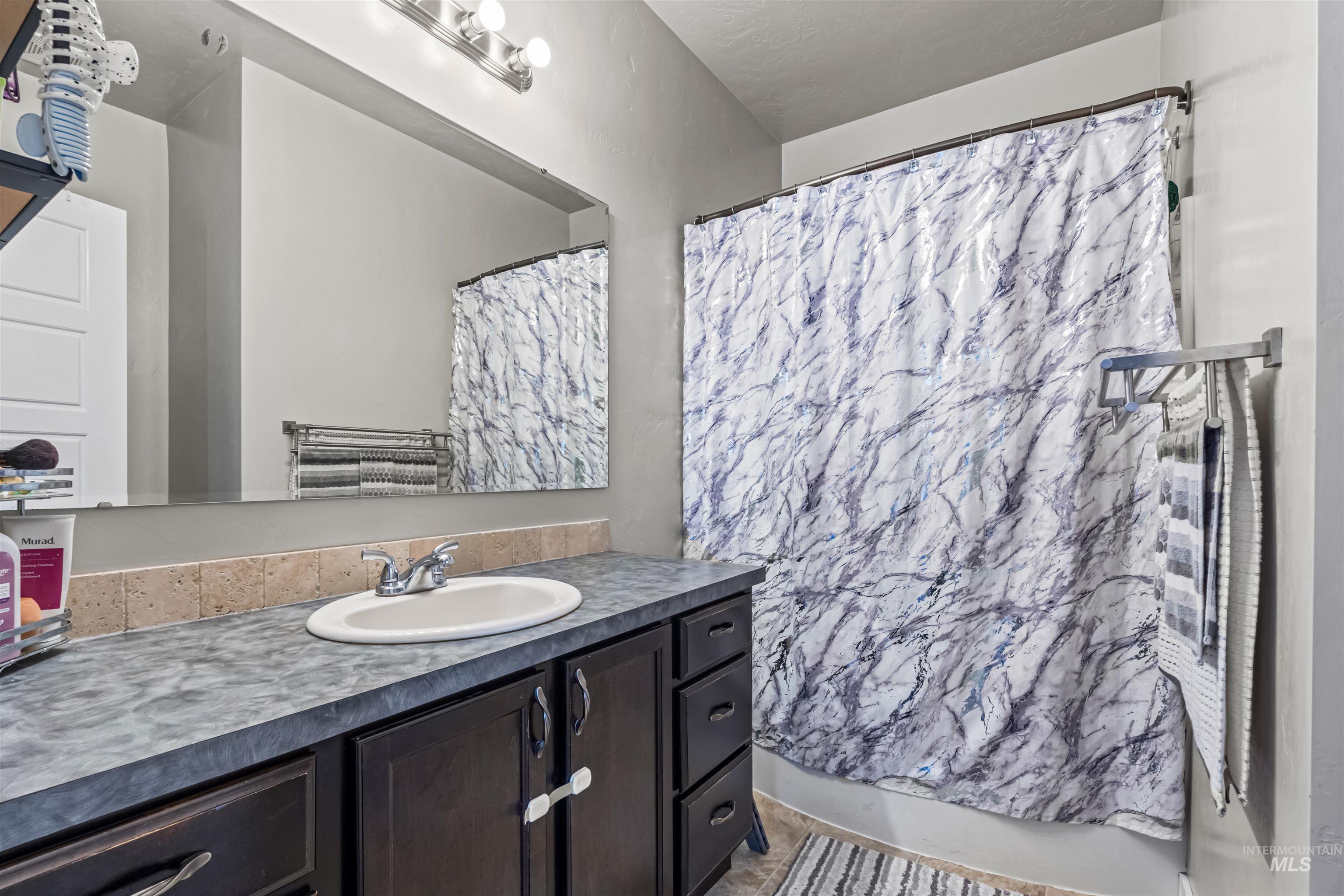12030 West Abram Street Boise, ID 83713 - Photo 17 of 26 Bathroom with vanity