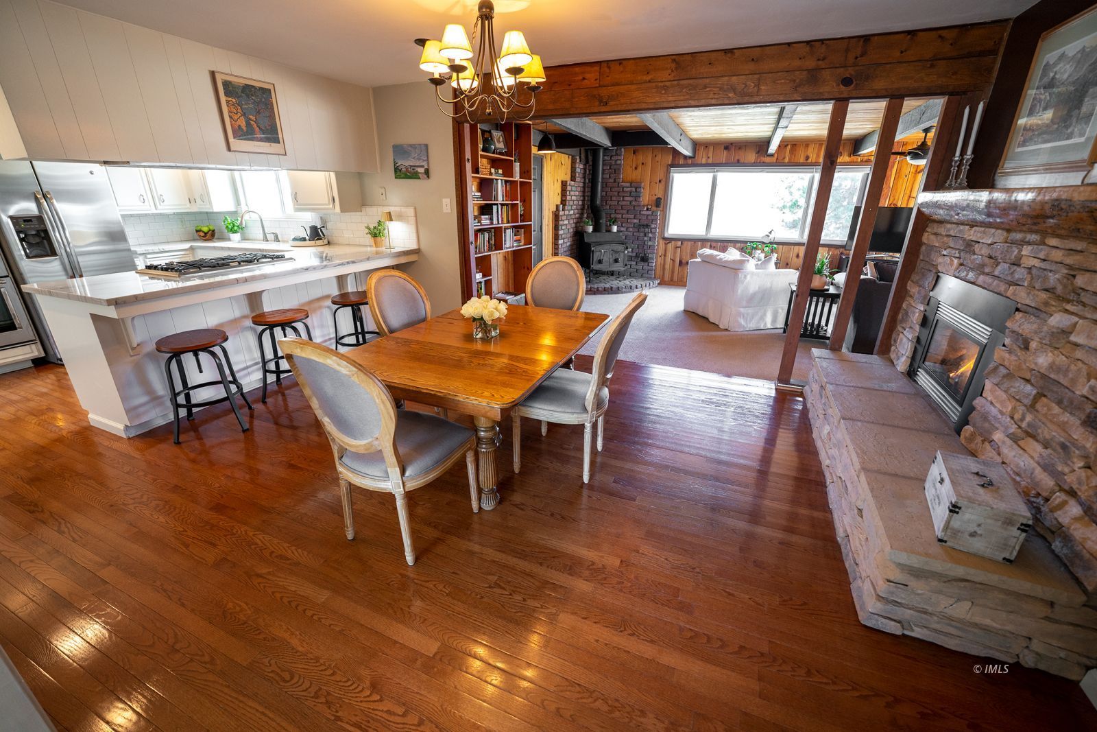 320 Apollo Circle Bishop, CA 93514 - Photo 18 of 35 a view of a dining room with furniture and wooden floor