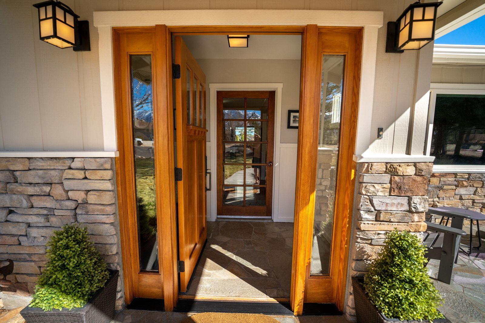 320 Apollo Circle Bishop, CA 93514 - Photo 2 of 35 front view of a house with a door and a potted plant