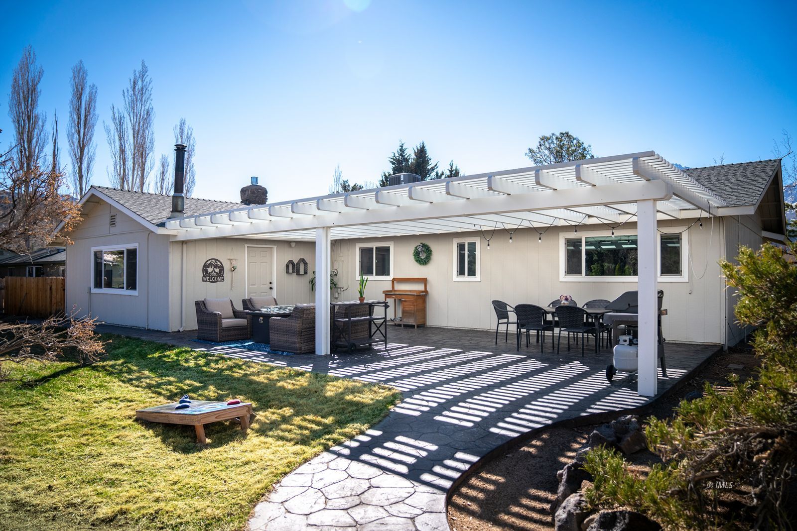 320 Apollo Circle Bishop, CA 93514 - Photo 26 of 35 a front view of a house with patio
