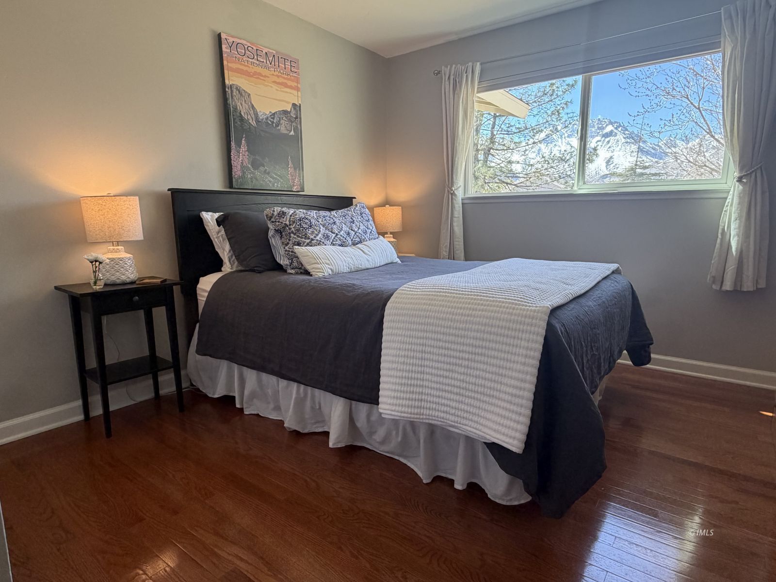 320 Apollo Circle Bishop, CA 93514 - Photo 7 of 35 a bedroom with a bed and window