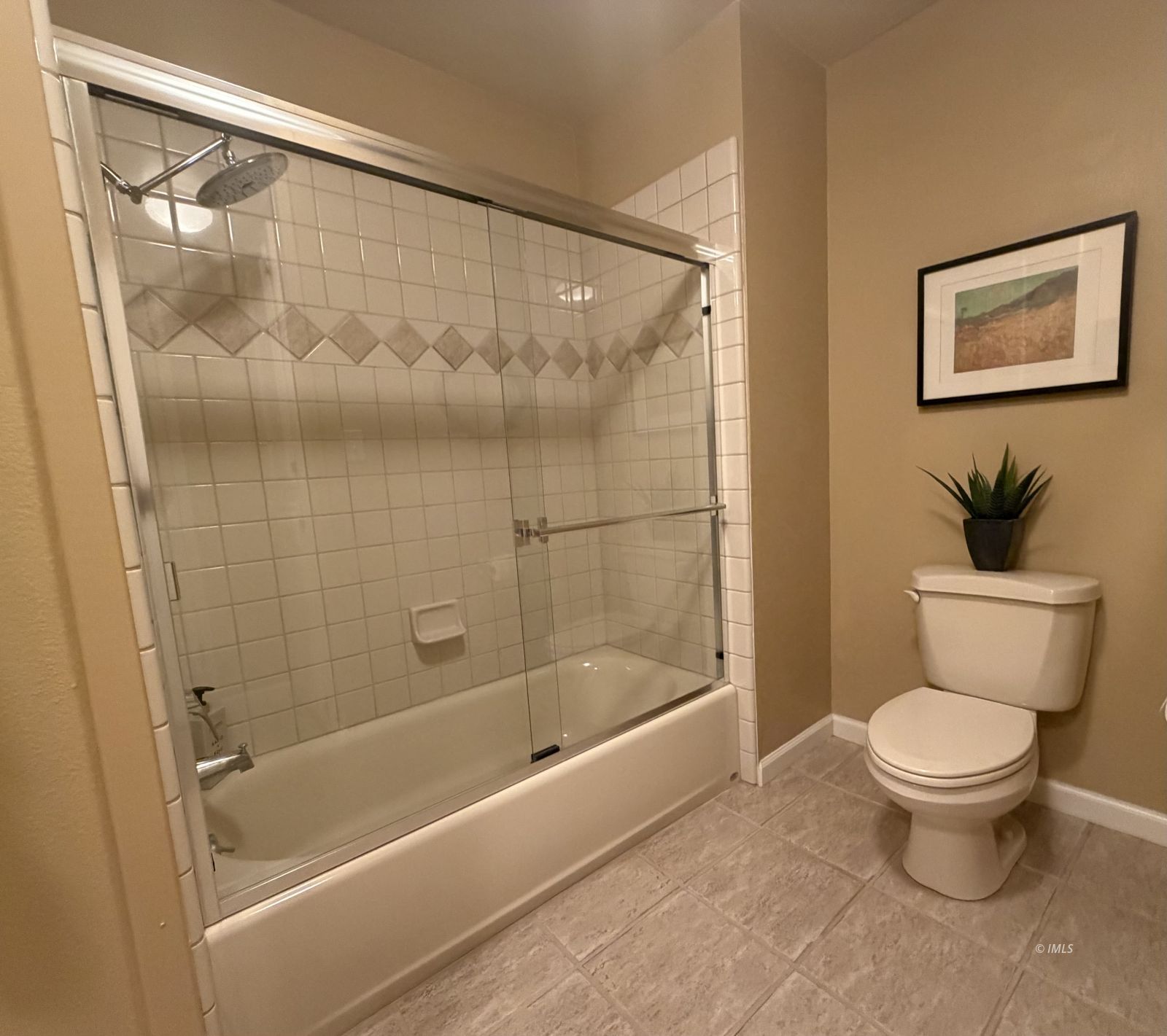 320 Apollo Circle Bishop, CA 93514 - Photo 9 of 35 a bathroom with a toilet and a shower