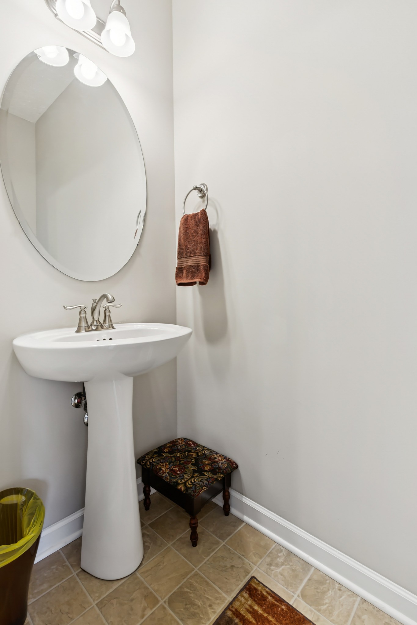 5840 Monroe Crossing Antioch, TN 37013 - Photo 13 of 25 a bathroom with a sink and a mirror