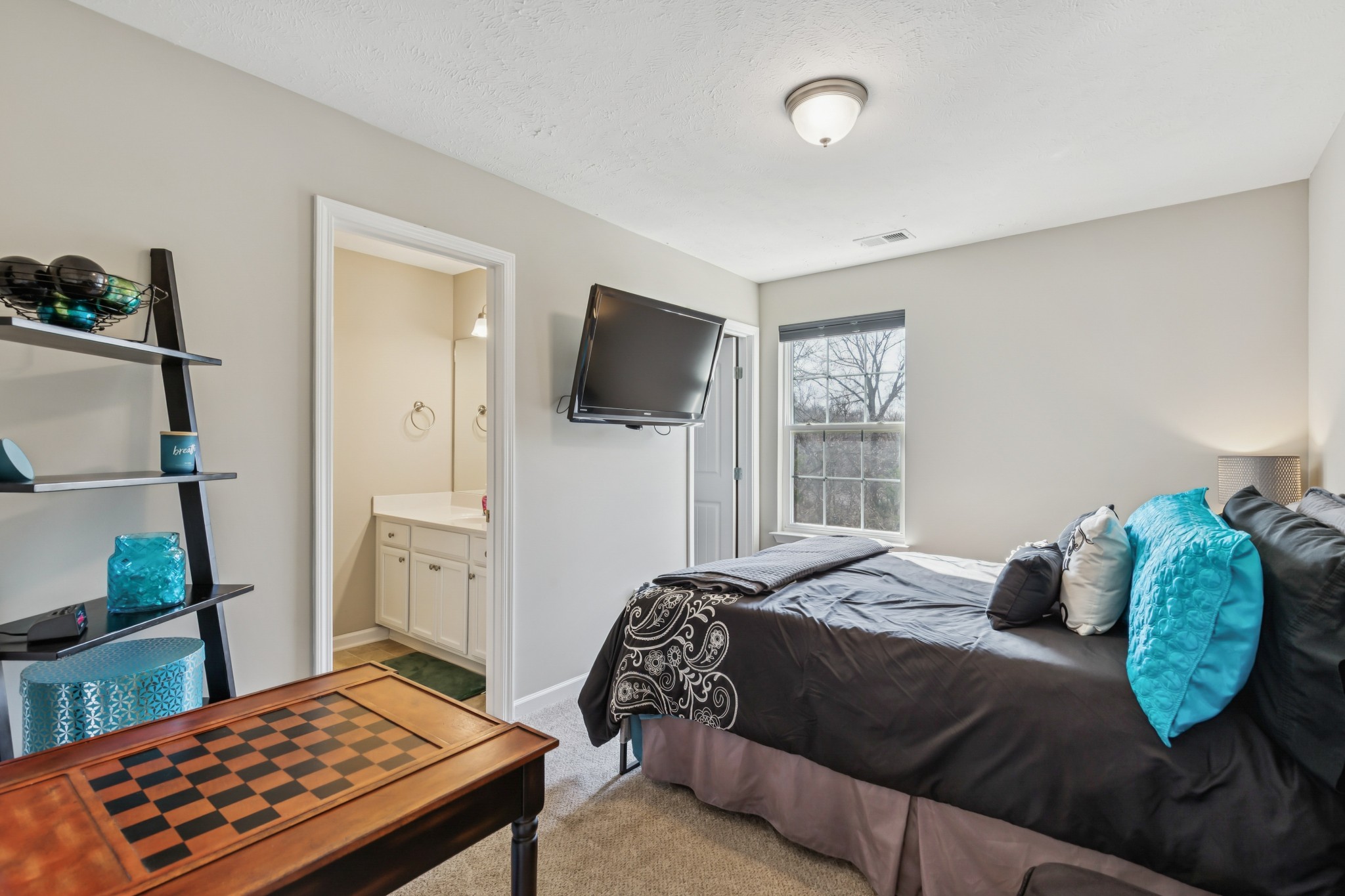 5840 Monroe Crossing Antioch, TN 37013 - Photo 20 of 25 a bedroom with a bed and a window