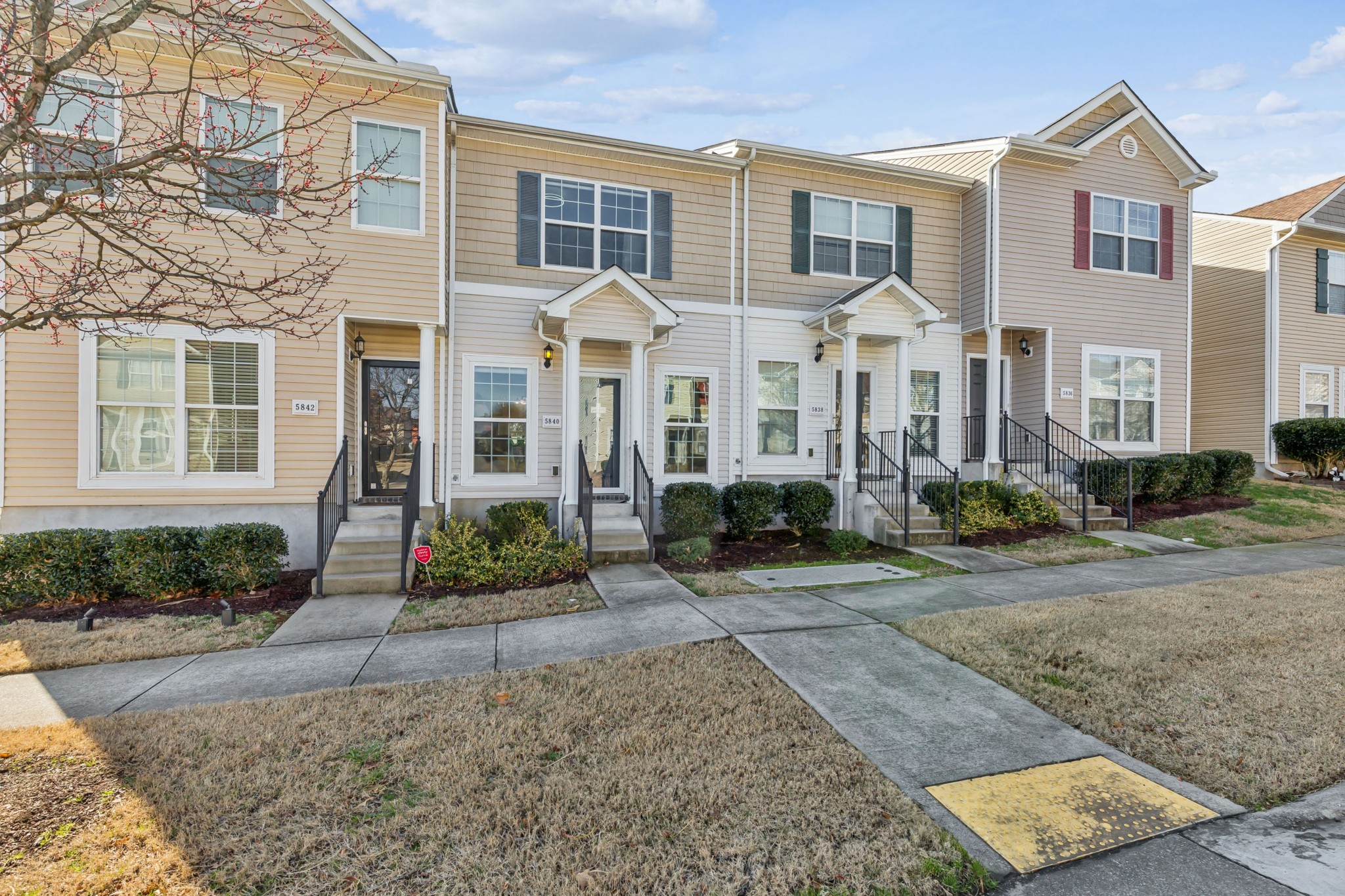 5840 Monroe Crossing Antioch, TN 37013 - Photo 2 of 25 a front view of a house with garden