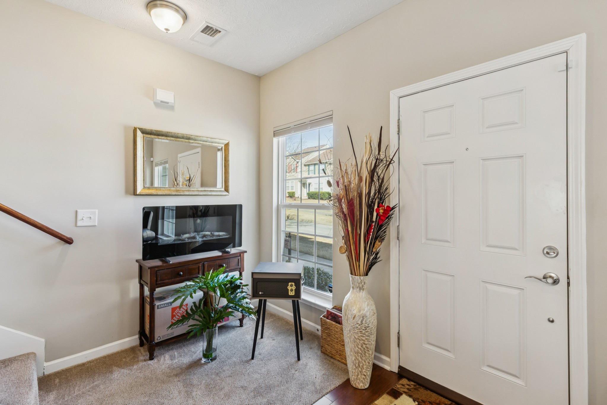 5840 Monroe Crossing Antioch, TN 37013 - Photo 6 of 25 a living room with furniture and a flat screen tv