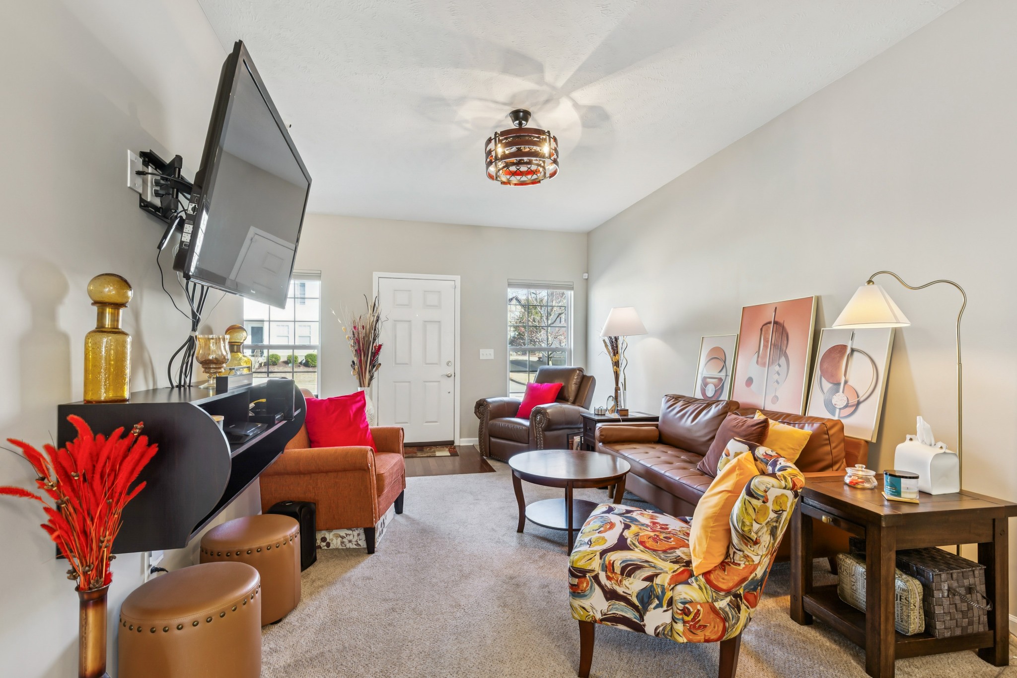 5840 Monroe Crossing Antioch, TN 37013 - Photo 7 of 25 a living room with furniture a rug and white walls