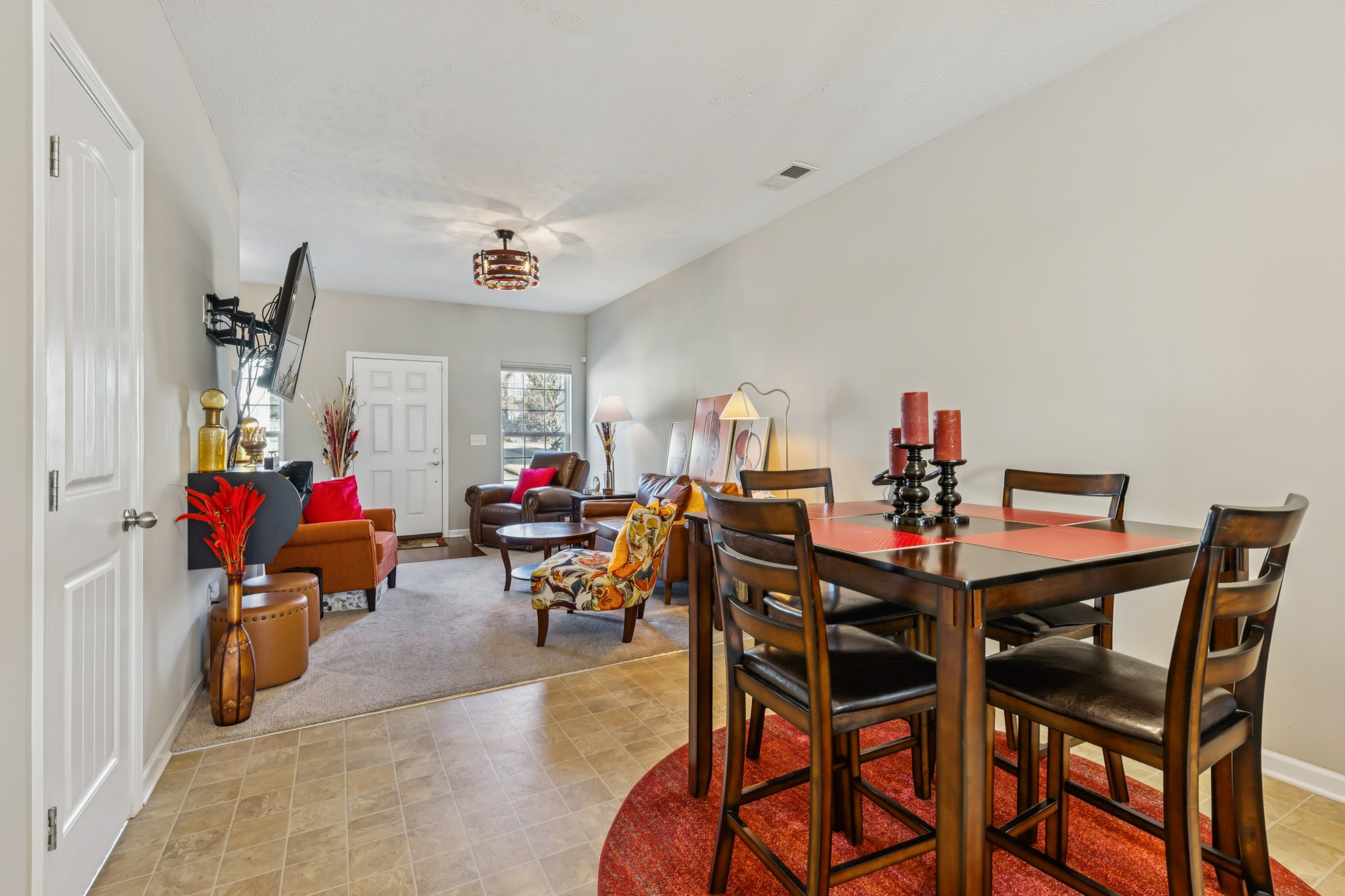 5840 Monroe Crossing Antioch, TN 37013 - Photo 9 of 25 a view of a dining room with furniture and a chandelier
