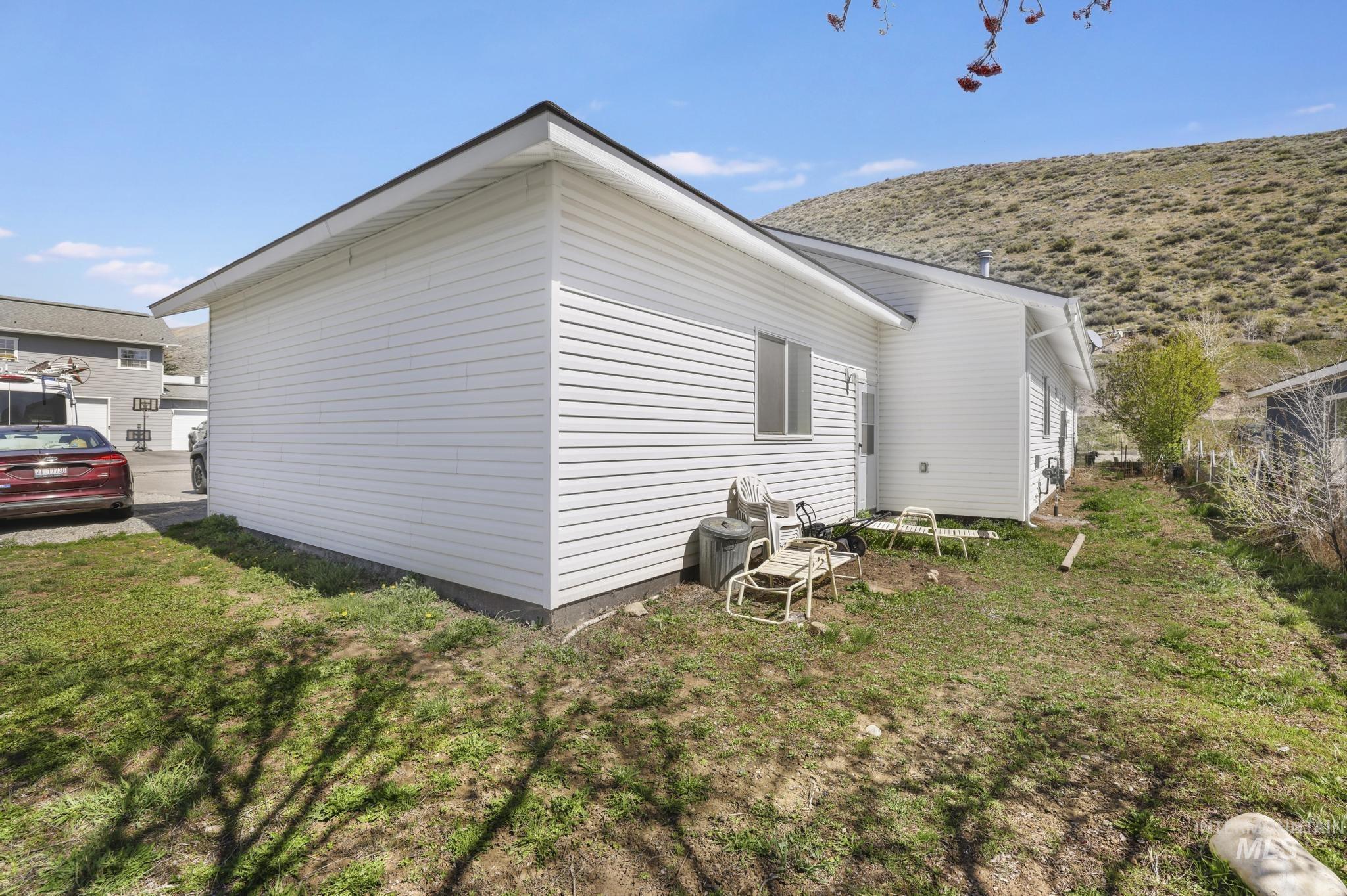 321 North 7th Street Bellevue, ID 83313 - Photo 14 of 15 View of side of property with a lawn