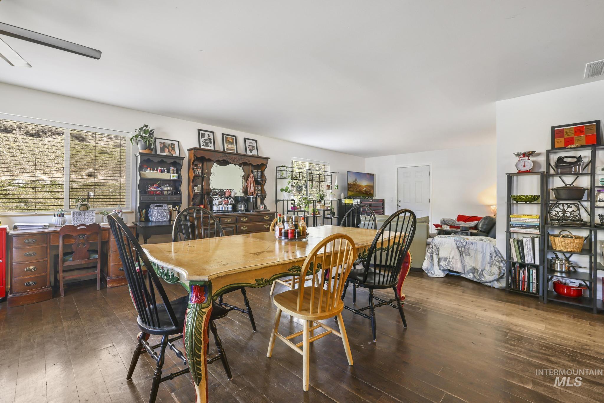 321 North 7th Street Bellevue, ID 83313 - Photo 2 of 15 Dining room featuring hardwood / wood-style floors and a ceiling fan