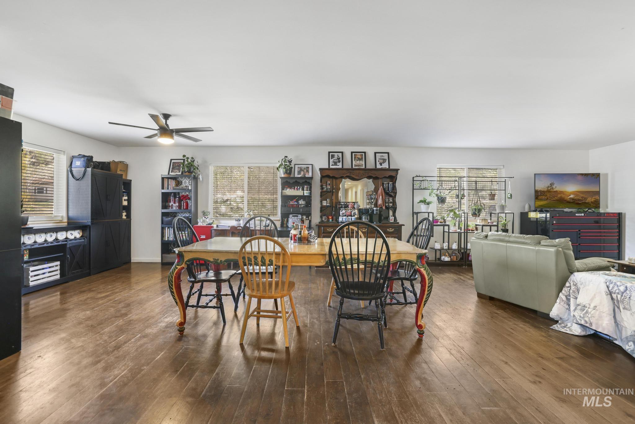 321 North 7th Street Bellevue, ID 83313 - Photo 5 of 15 Dining area with ceiling fan and hardwood / wood-style floors