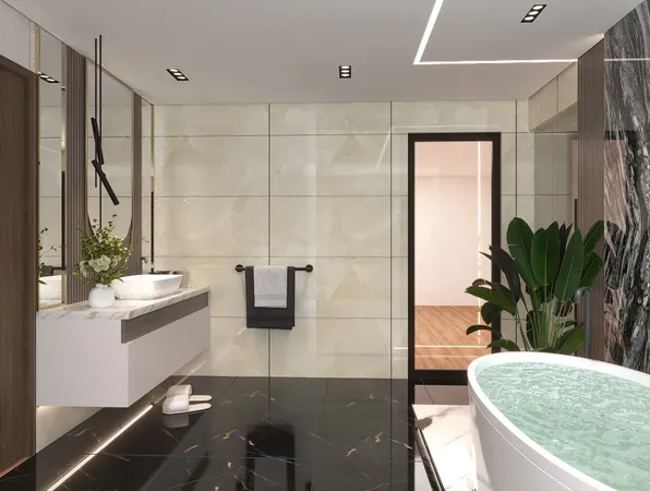a bathroom with a shower and a tiled wall