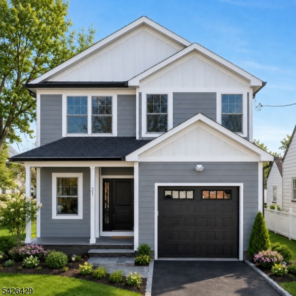 21 Spruce Street Cranford, NJ 07016 - Photo 1 of 40 a front view of a house with garden