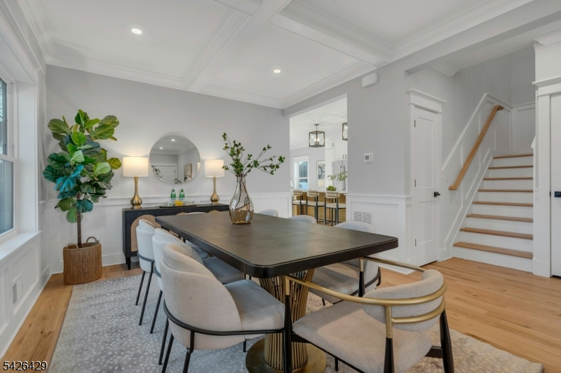 21 Spruce Street Cranford, NJ 07016 - Photo 14 of 40 a view of a dining room with furniture and wooden floor