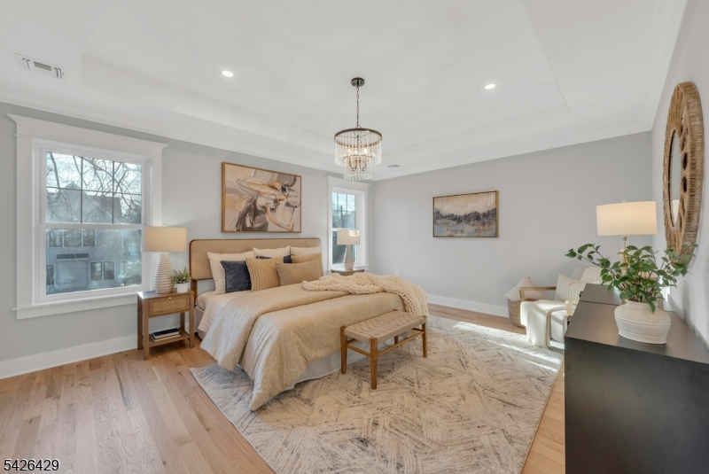 21 Spruce Street Cranford, NJ 07016 - Photo 18 of 40 a bedroom with a bed and a window