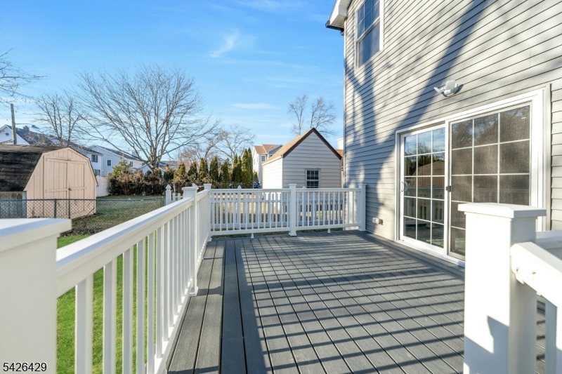 21 Spruce Street Cranford, NJ 07016 - Photo 34 of 40 a view of a house with backyard and deck