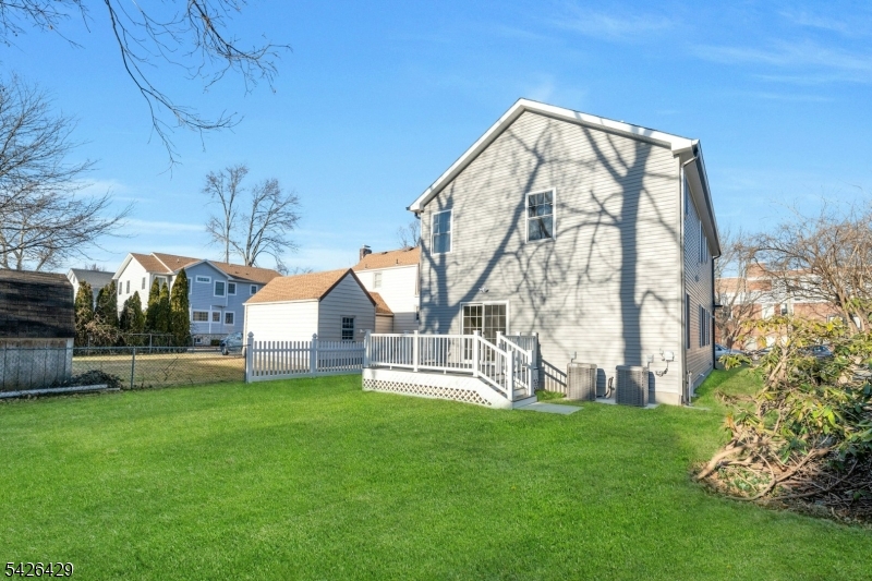 21 Spruce Street Cranford, NJ 07016 - Photo 36 of 40 a view of a house with a yard
