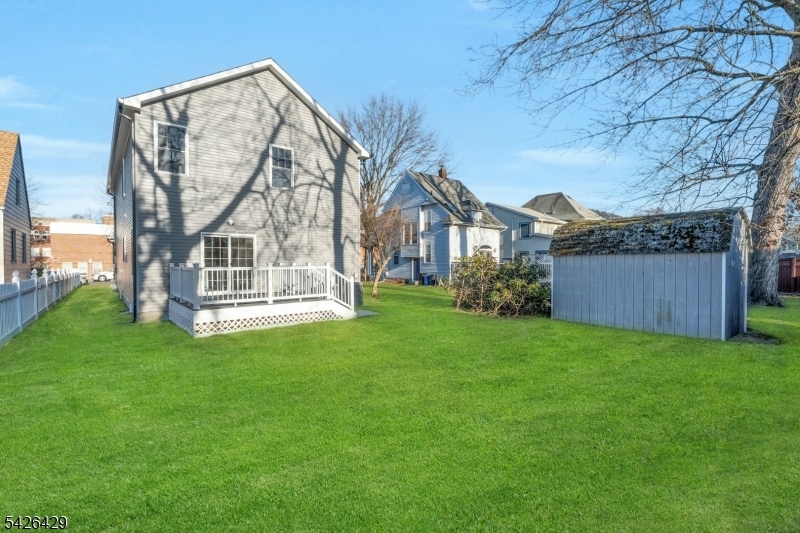 21 Spruce Street Cranford, NJ 07016 - Photo 37 of 40 a view of a house with backyard and garden