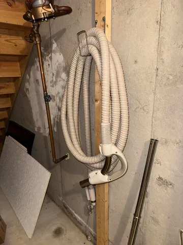 a view of balcony with wooden floor and fence