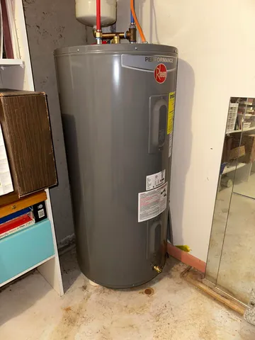 a view of a deck with wooden floor and barbeque oven