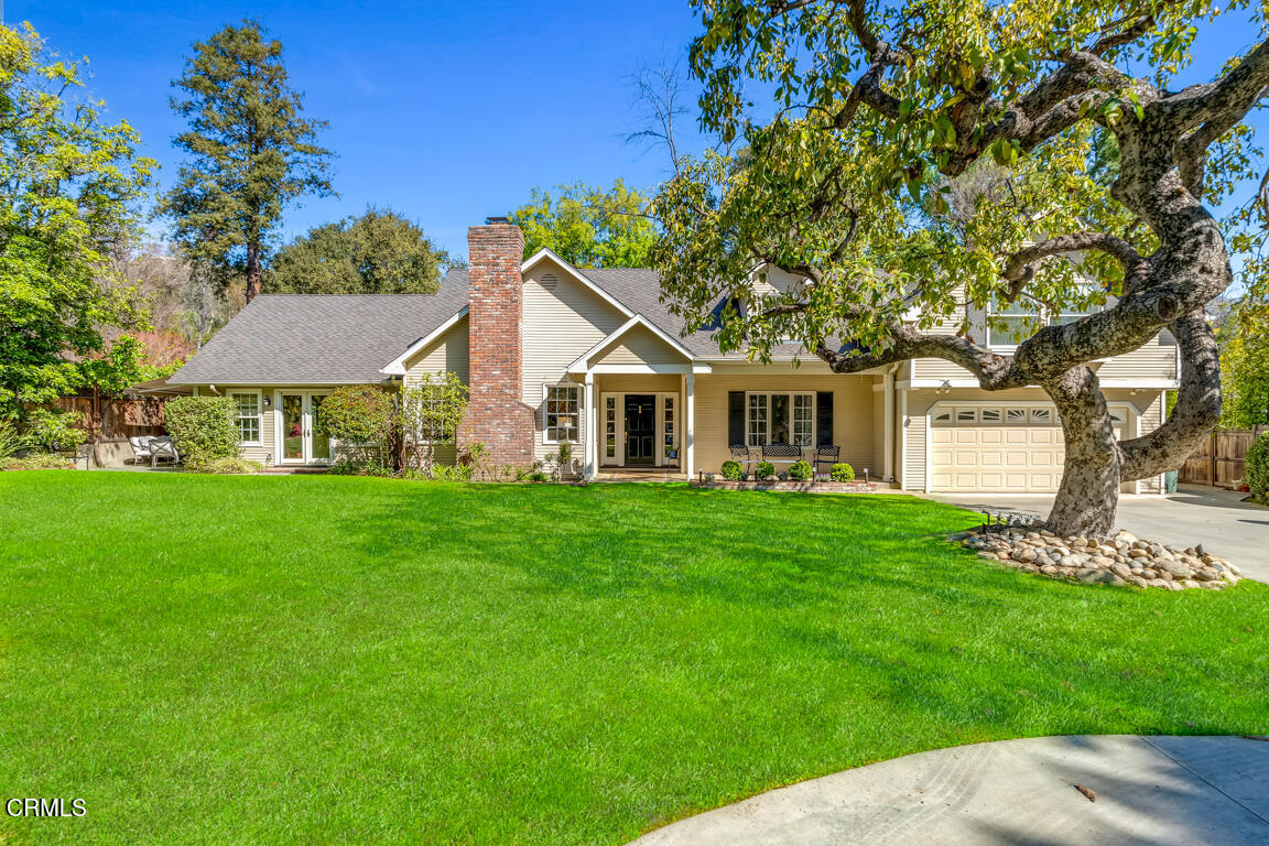 1333 Lida Street Pasadena, CA 91103 - Photo 1 of 38 a front view of a house with a garden