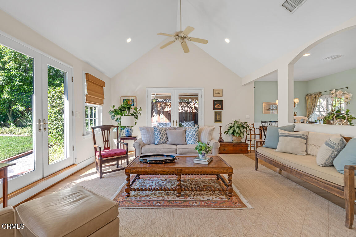 1333 Lida Street Pasadena, CA 91103 - Photo 15 of 38 a living room with furniture a rug and a large window