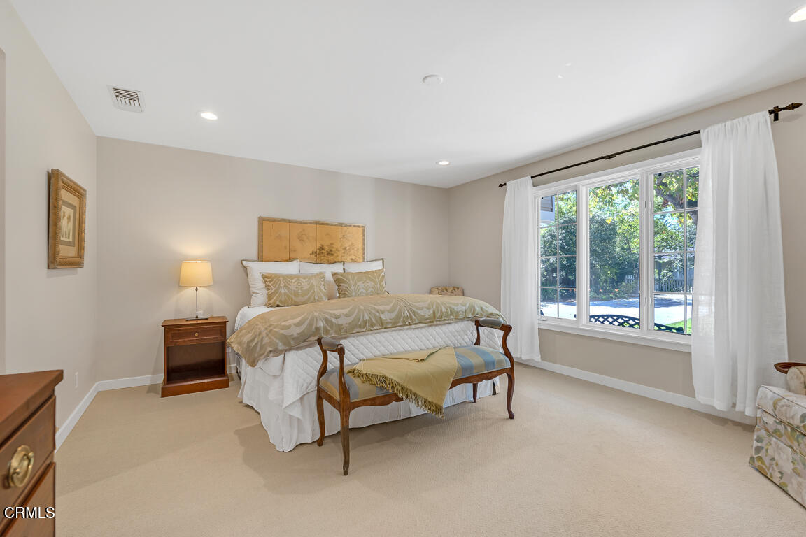 1333 Lida Street Pasadena, CA 91103 - Photo 20 of 38 a bed sitting in a spacious bedroom next to a window