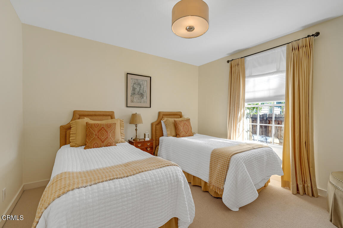 1333 Lida Street Pasadena, CA 91103 - Photo 24 of 38 a bedroom with two beds and a large window