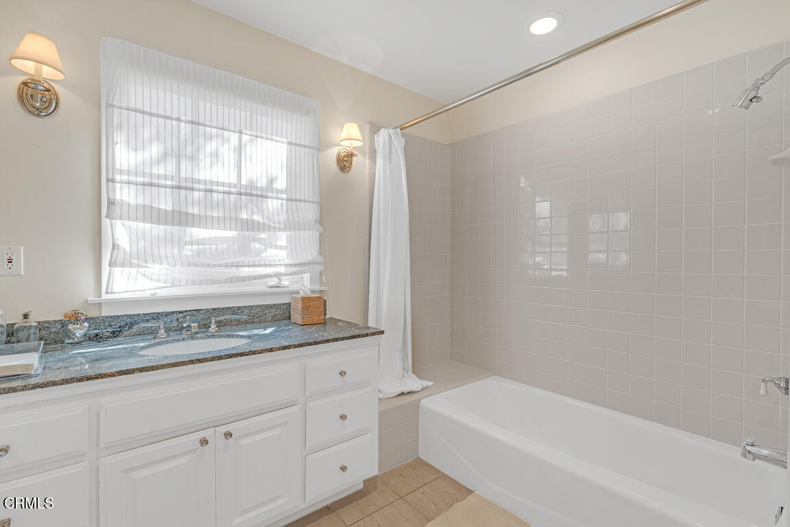 1333 Lida Street Pasadena, CA 91103 - Photo 25 of 38 a bathroom with a sink and a bathtub