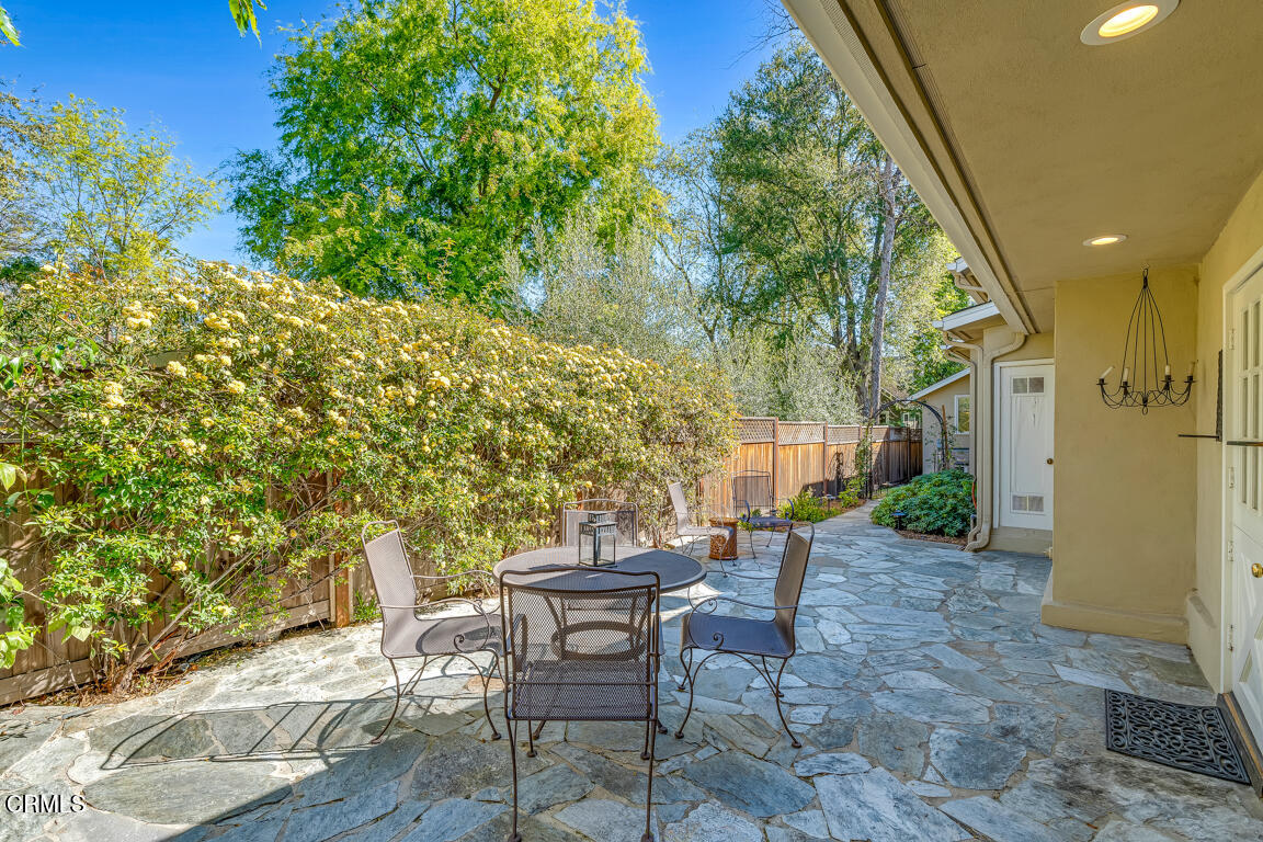1333 Lida Street Pasadena, CA 91103 - Photo 34 of 38 a view of a patio with table and chairs and potted plants