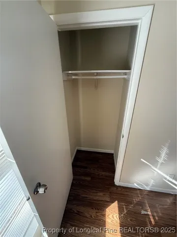 a view of entryway with wooden floor