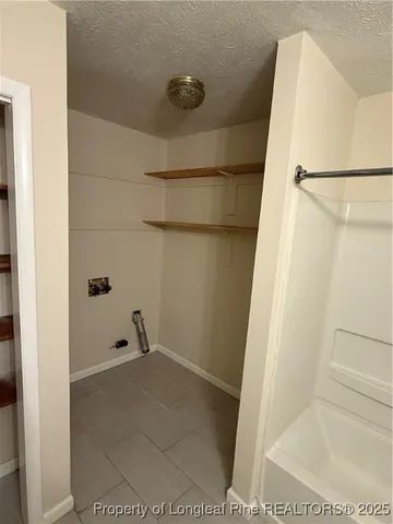 a bathroom with a toilet and a sink