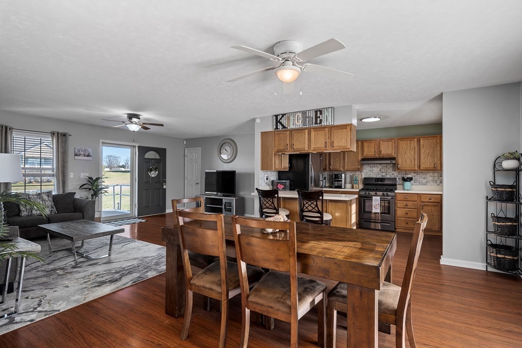 1656 Parker Road Sparta, TN 38583 - Photo 11 of 32 a view of a dining room with furniture window and wooden floor