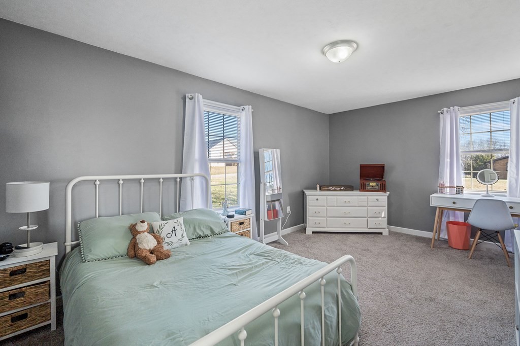 1656 Parker Road Sparta, TN 38583 - Photo 21 of 32 a bedroom with furniture and a window