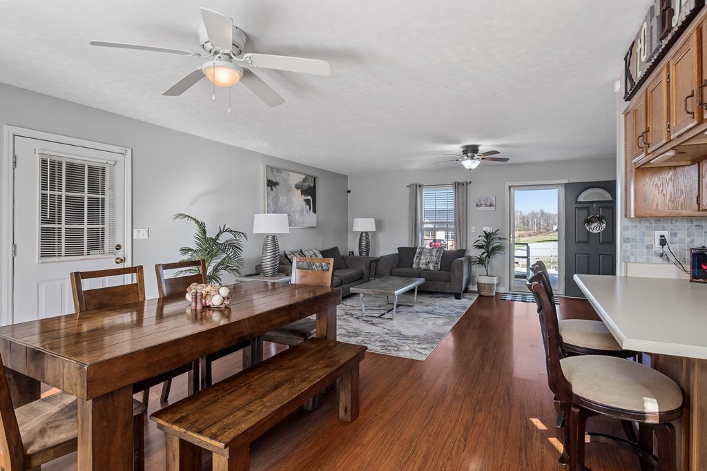 1656 Parker Road Sparta, TN 38583 - Photo 10 of 32 a living room with furniture a chandelier and a dining room