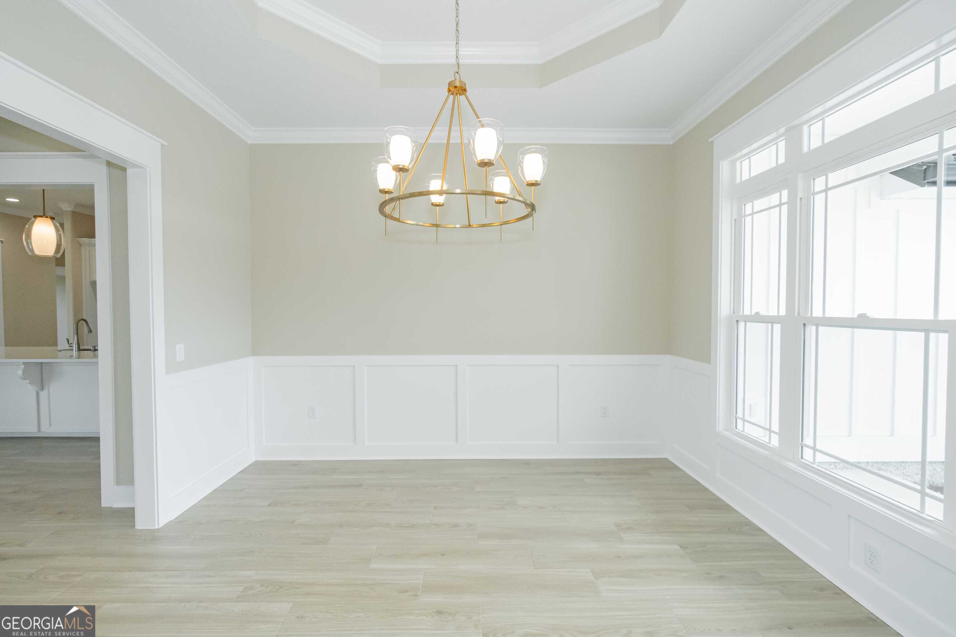 201 Riley Hunter Drive Kingsland, GA 31548 - Photo 12 of 79 wooden floor in an empty room with a window