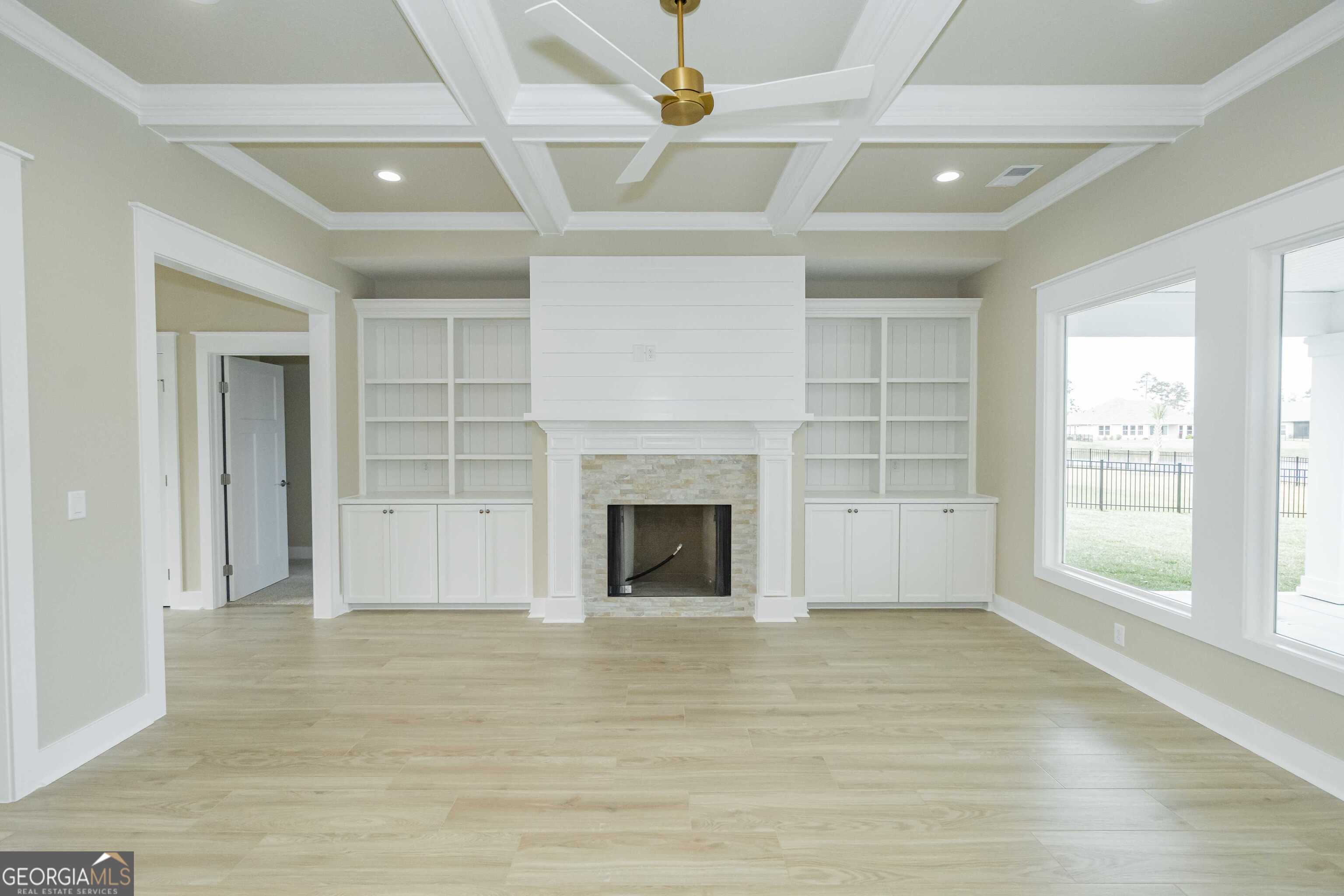 201 Riley Hunter Drive Kingsland, GA 31548 - Photo 17 of 79 a view of a livingroom with a fireplace and window